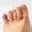 Swollen and bruised foot with visible discoloration on the fifth toe, showing signs of a broken pinky toe injury.